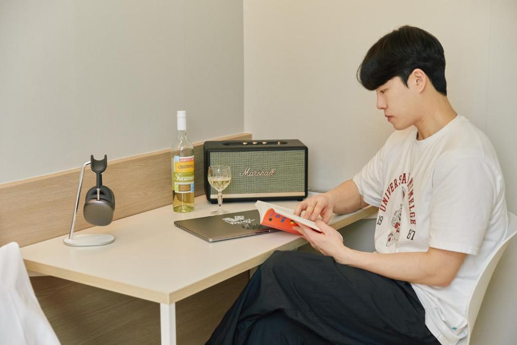 TV a/nebo společenská místnost v ubytování Aank Hotel Incheon Songdo