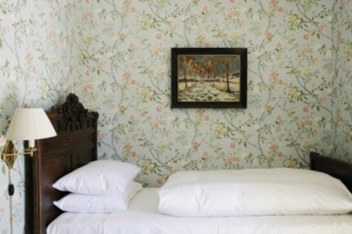 Postel nebo postele na pokoji v ubytování Hotel Frederiksminde
