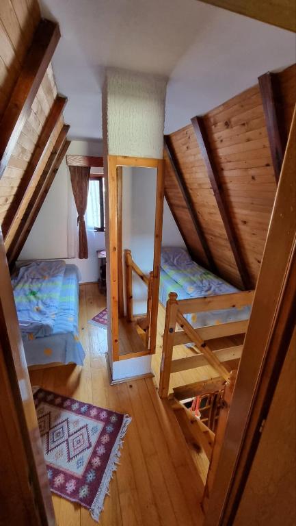 Krevet ili kreveti u jedinici u okviru objekta Planinska Kuća Dušan