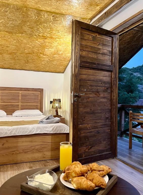 Postel nebo postele na pokoji v ubytování Ojakh Resort