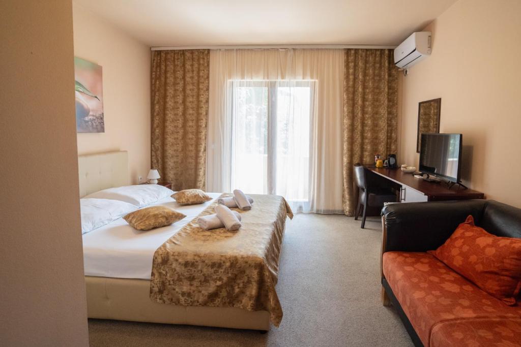 Postel nebo postele na pokoji v ubytování Garden House