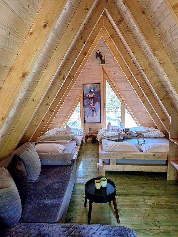 Postel nebo postele na pokoji v ubytování Forest Rhapsody Brezna