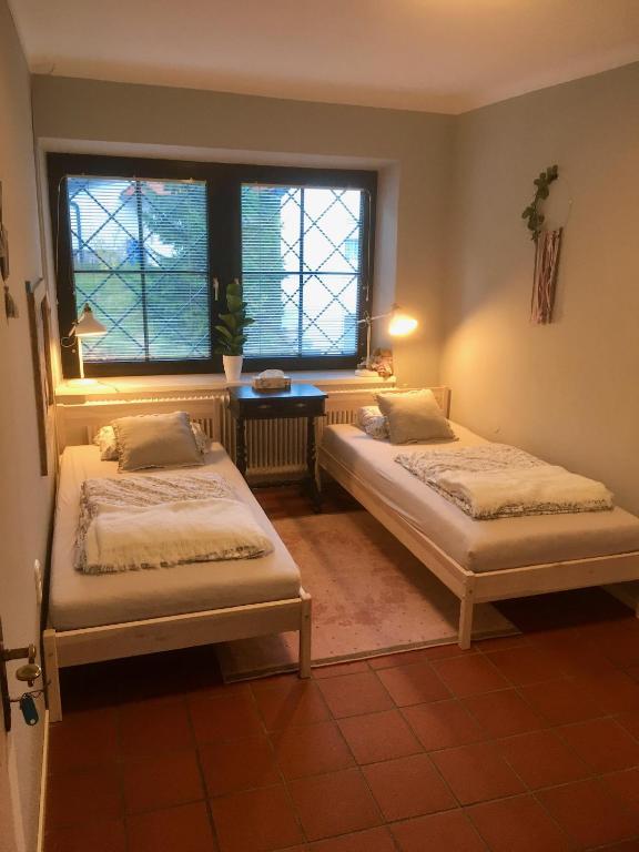 Postel nebo postele na pokoji v ubytování hello. DIE FERIENWOHNUNG