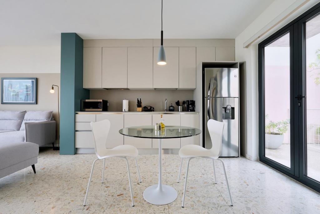 Kuchyň nebo kuchyňský kout v ubytování La Moderna by Wynwood House