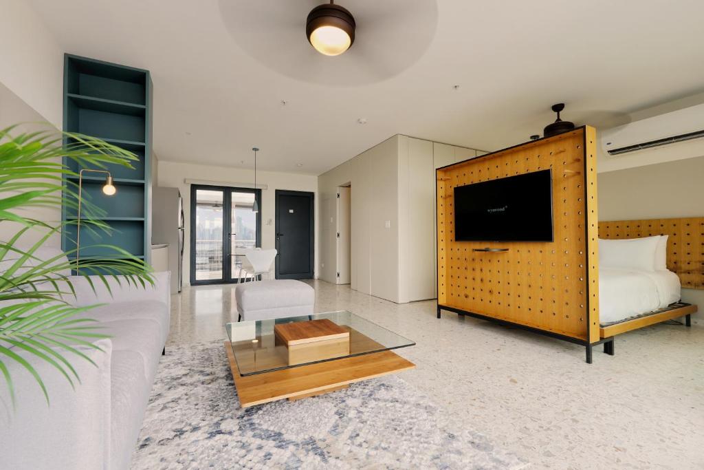 TV a/nebo společenská místnost v ubytování La Moderna by Wynwood House
