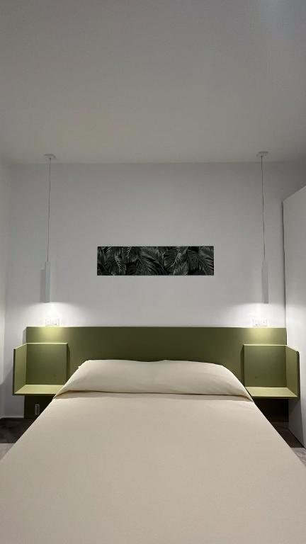 Postel nebo postele na pokoji v ubytování B&b Villa Jasmine