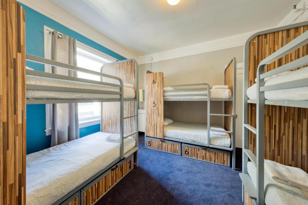 a group of bunk beds in a dorm room at HI San Francisco Downtown Hostel in San Francisco