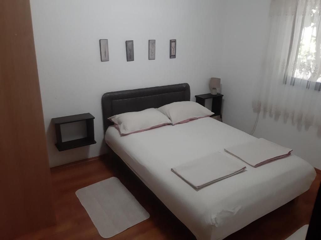 Postel nebo postele na pokoji v ubytování Apartman Amra-beautiful holiday home