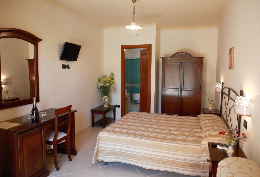 A bed or beds in a room at Villa Cristina