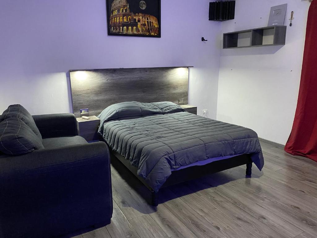 En eller flere senge i et værelse på Habitación independiente a 5 min de fundidora