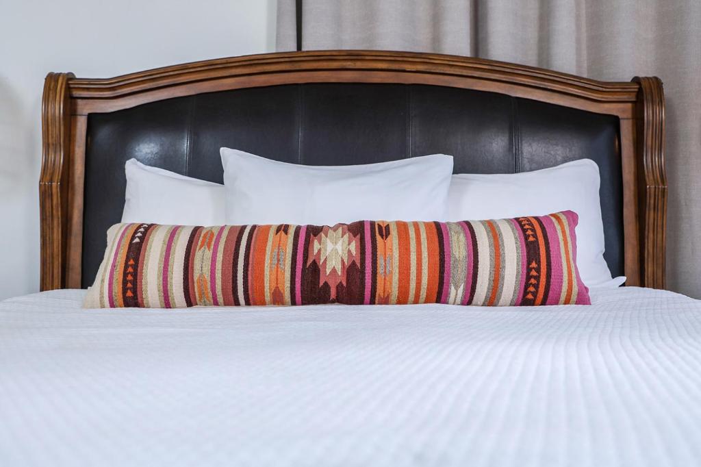 Postel nebo postele na pokoji v ubytování El Regalo Resort