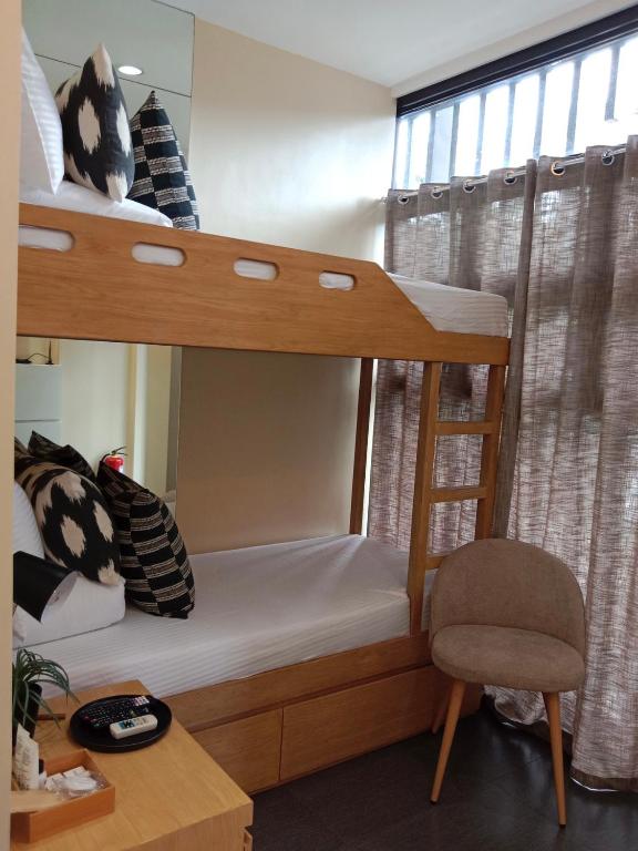 Postel nebo postele na pokoji v ubytování D' Residences