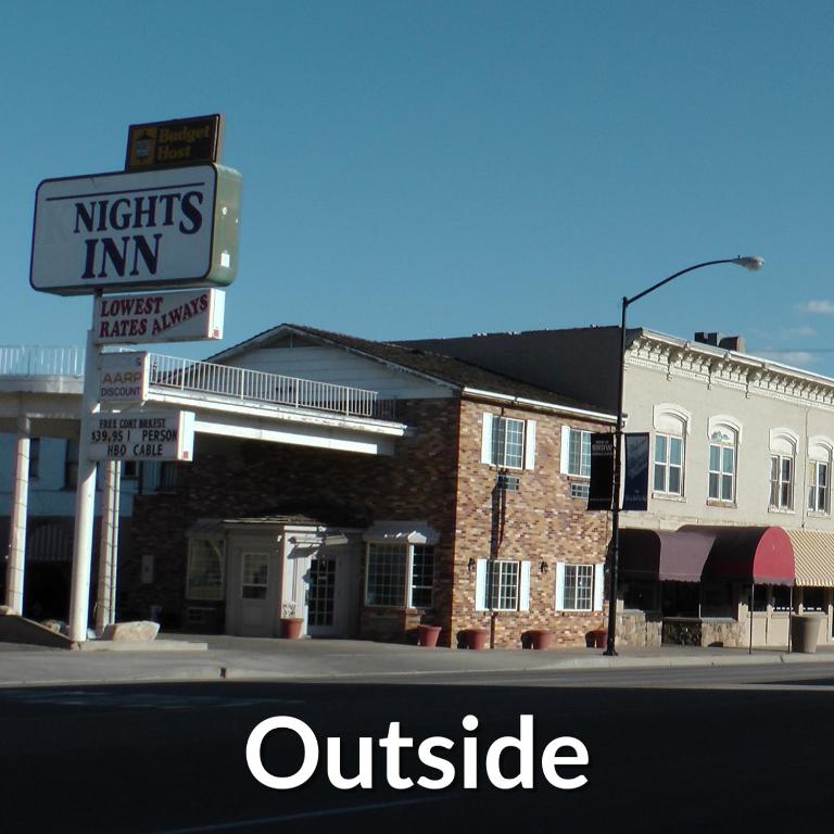a sign in front of a building on a street at Nights Inn - Richfield in Richfield