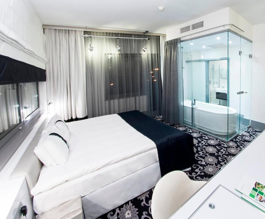 Posteľ alebo postele v izbe v ubytovaní Qubus Hotel Bydgoszcz