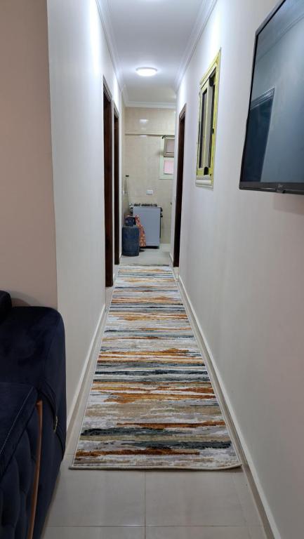 TV a/nebo společenská místnost v ubytování اجمل شاليه بقرية بلو باي بمرسى مطروح مكيف غرفتين ورسيبشن best chalet 2 room marsa matrouh blue bay village