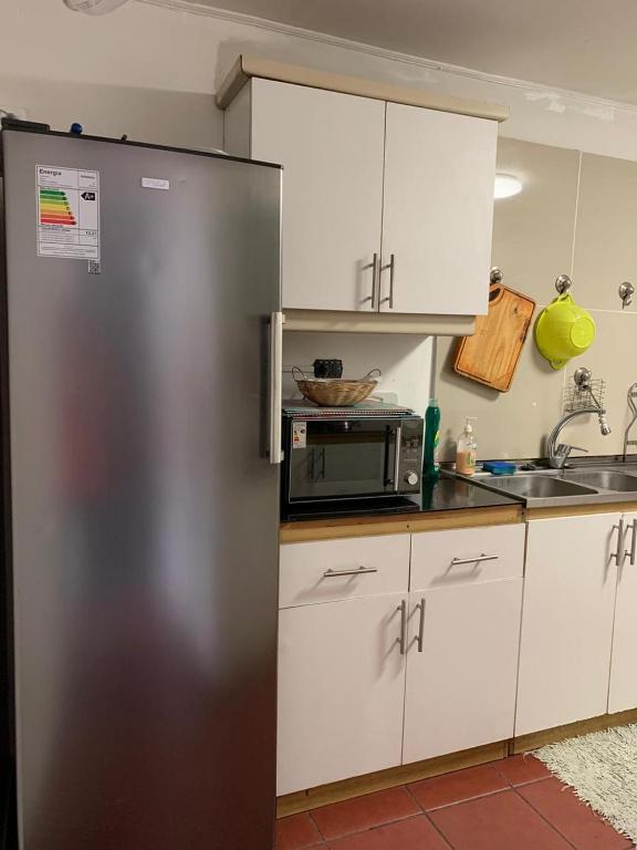Una cocina o cocineta en HOsTAL PALMED