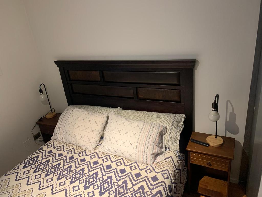 A bed or beds in a room at HOsTAL PALMED