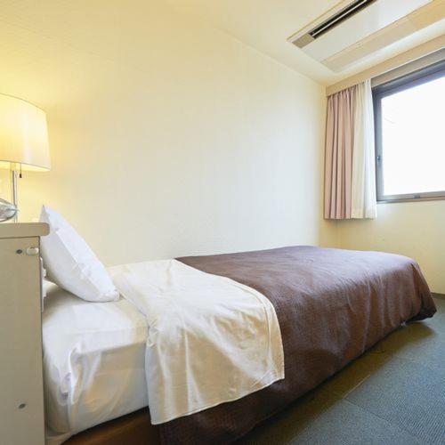 Postel nebo postele na pokoji v ubytování Hotel Select Inn Nishinasuno