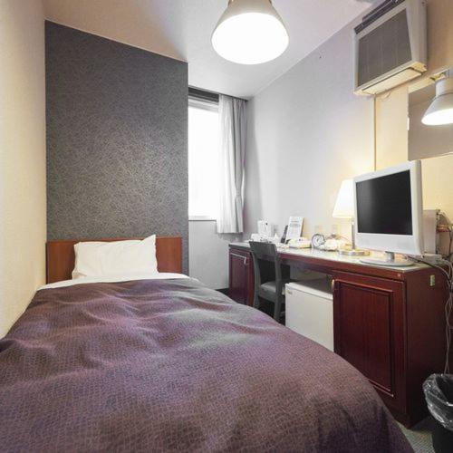 Postel nebo postele na pokoji v ubytování Hotel Select Inn Nishinasuno