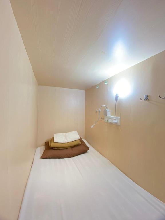 Postel nebo postele na pokoji v ubytování H2 Segama Backpacker