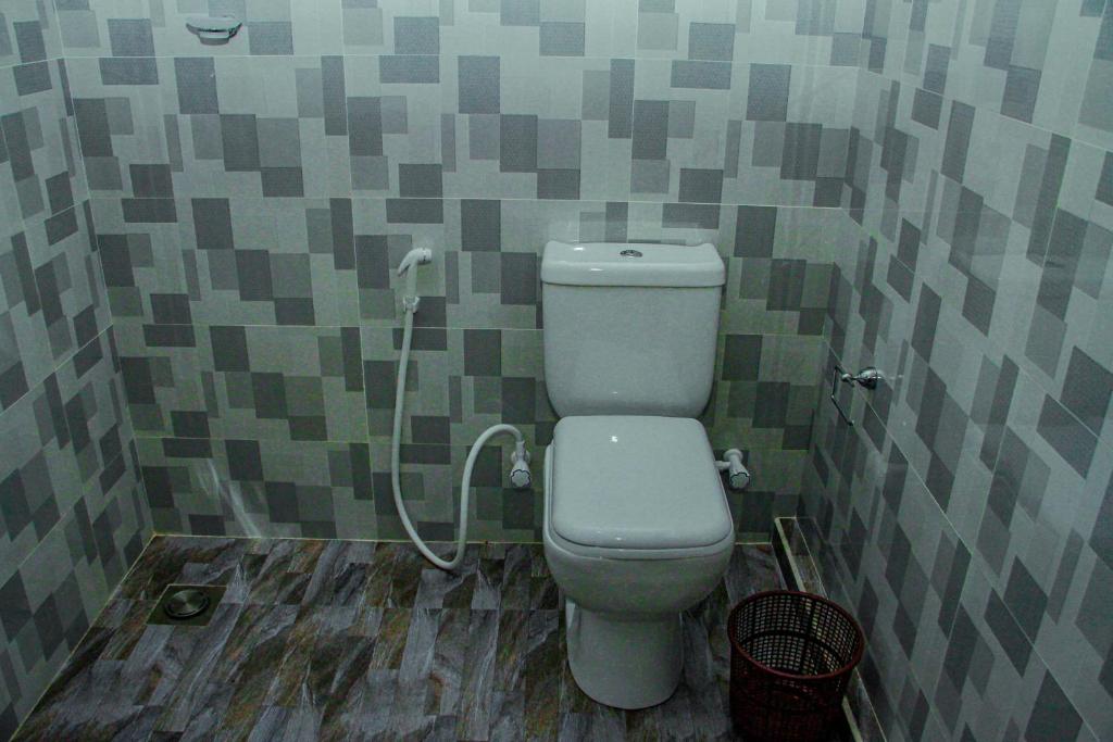 Koupelna v ubytování Sigiri Enaya Cottage