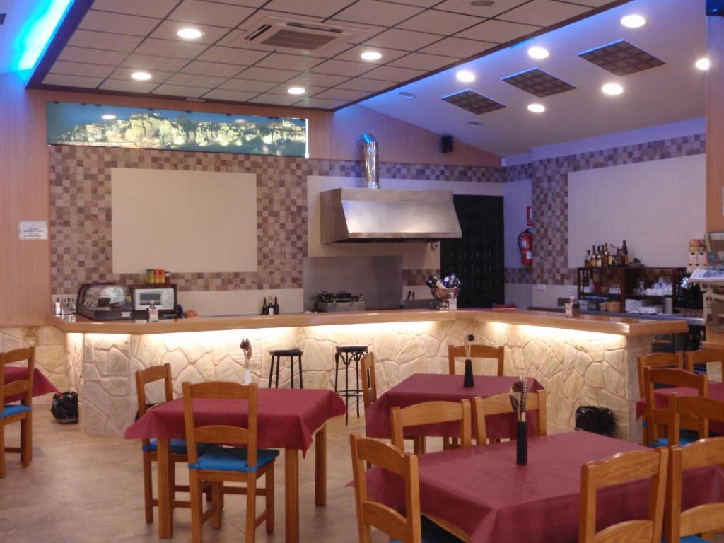 Reštaurácia alebo iné gastronomické zariadenie v ubytovaní El Rento Alojamiento Rural