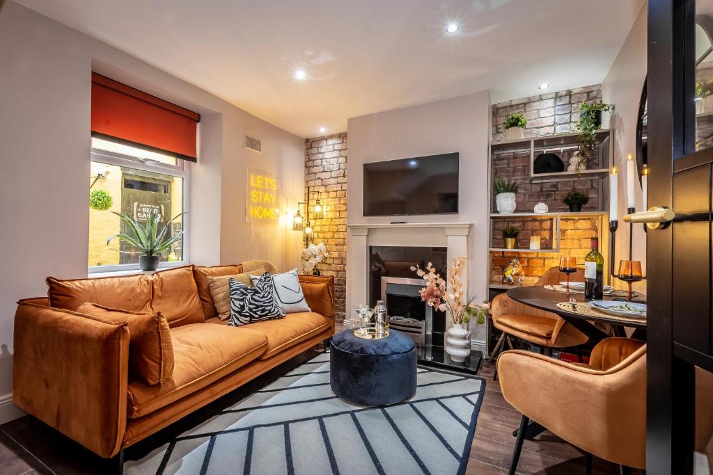 a living room with a couch and a table at Luxury House Waterford City Centre in Waterford