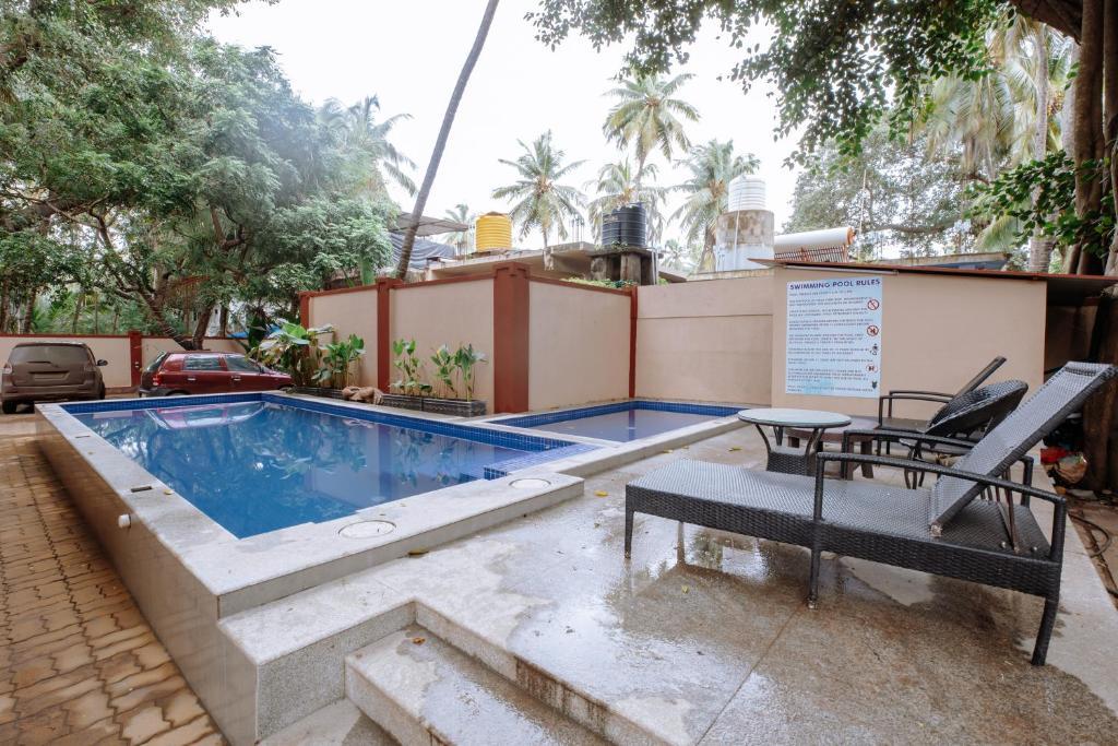 Bazén v ubytování Kay's Calangute Resort Service Apartments nebo v jeho okolí