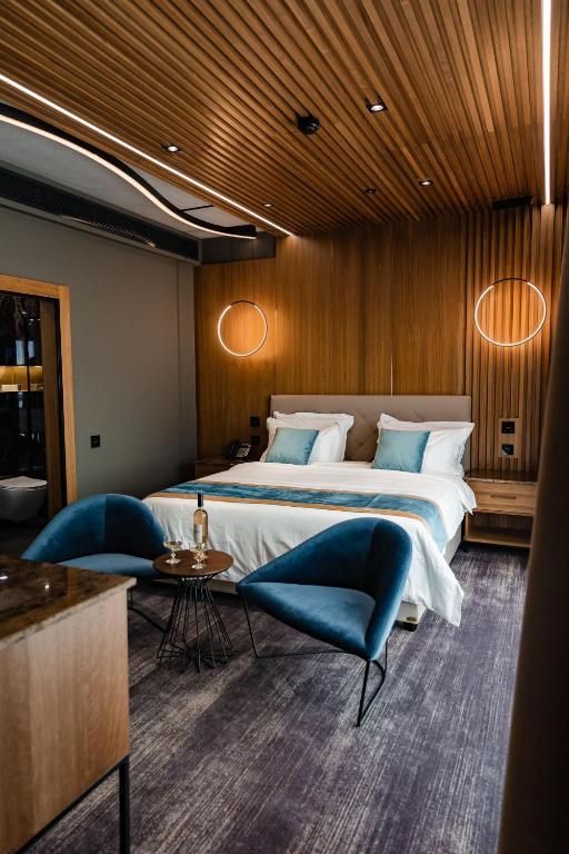 Postel nebo postele na pokoji v ubytování Hotel Vibre