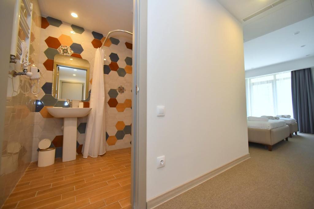Postel nebo postele na pokoji v ubytování Hotel Avenue 30