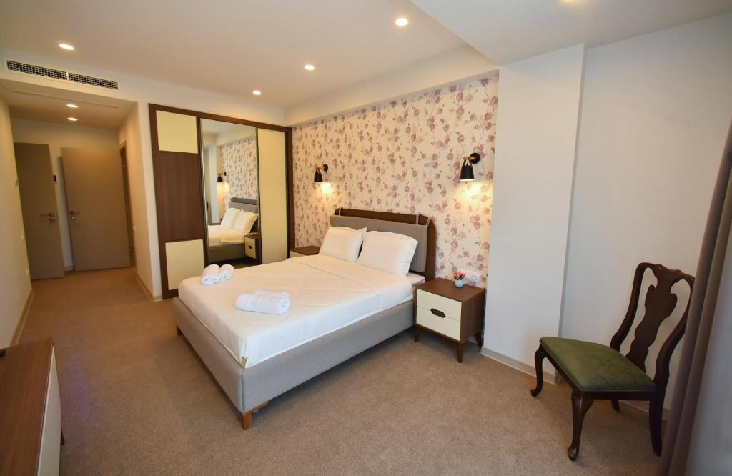 Postel nebo postele na pokoji v ubytování Hotel Avenue 30