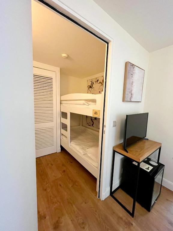 Postel nebo postele na pokoji v ubytování Hotel Edouard VII