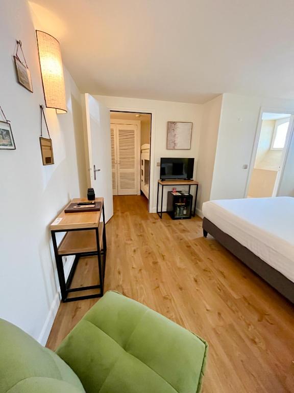 Postel nebo postele na pokoji v ubytování Hotel Edouard VII