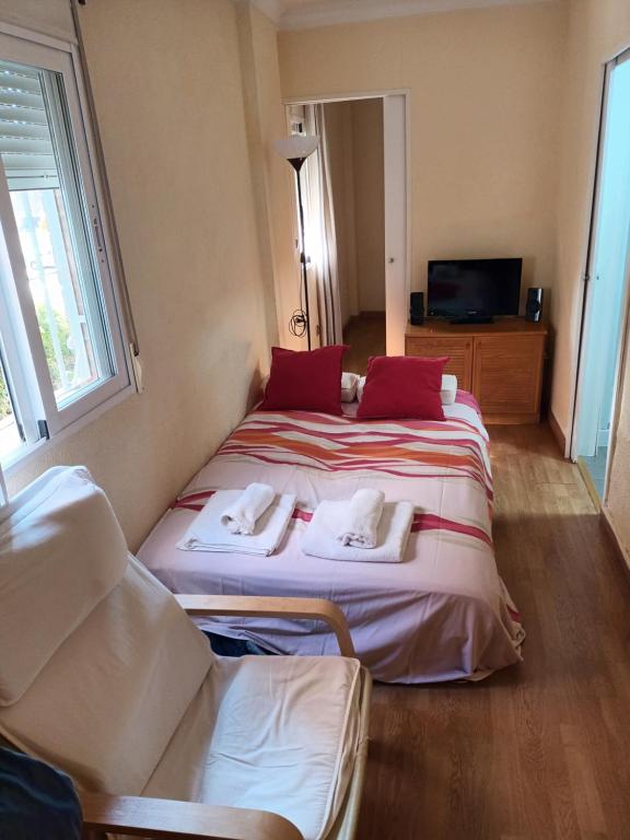 Posteľ alebo postele v izbe v ubytovaní APARTAMENTOS VIALIA SOL y PLAYA