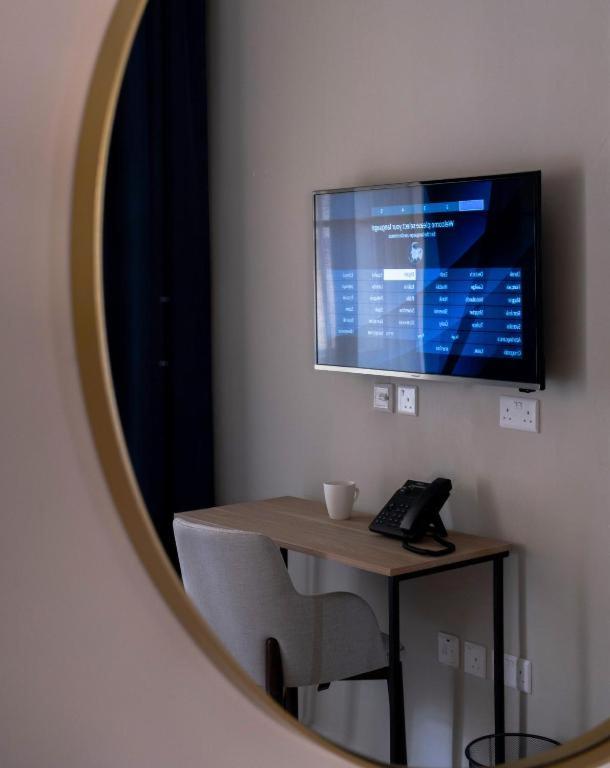 TV a/nebo společenská místnost v ubytování Mulberry Suites