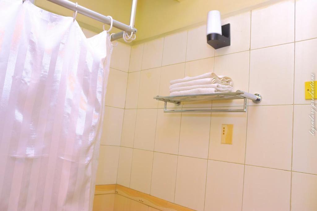 Koupelna v ubytování Jamia Central Hotel