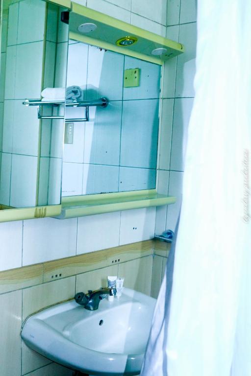 Koupelna v ubytování Jamia Central Hotel