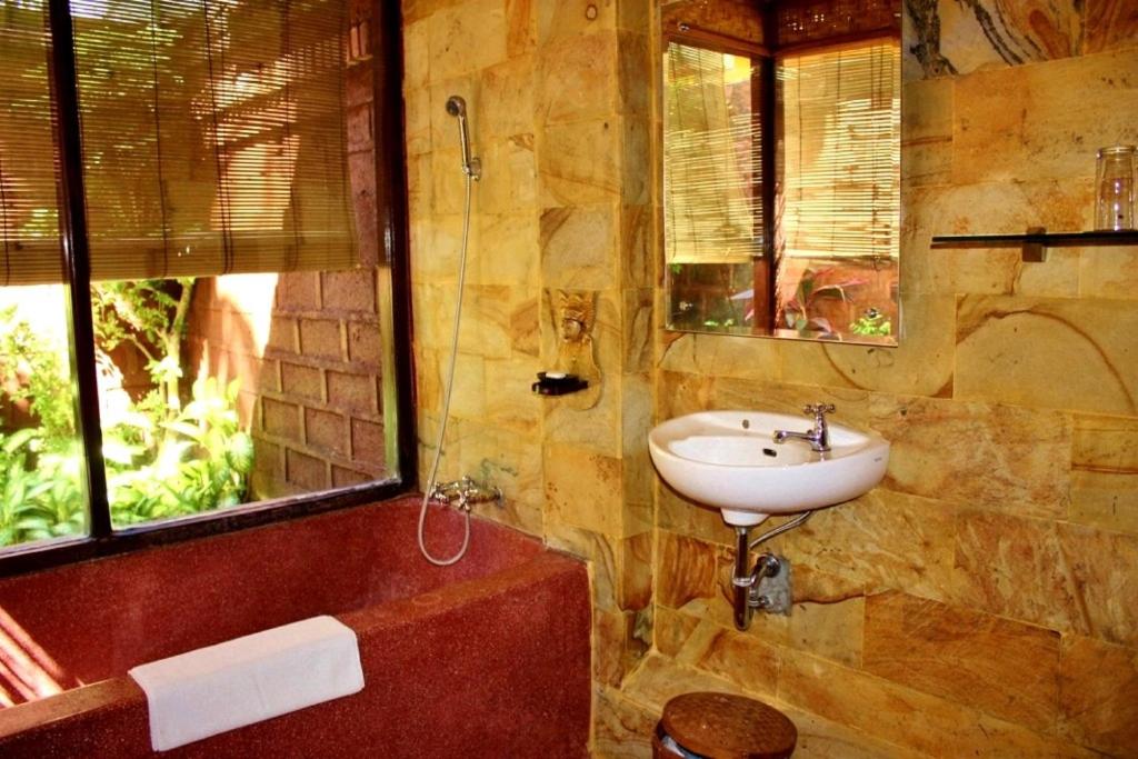 Koupelna v ubytování Puri Cendana Resort Bali