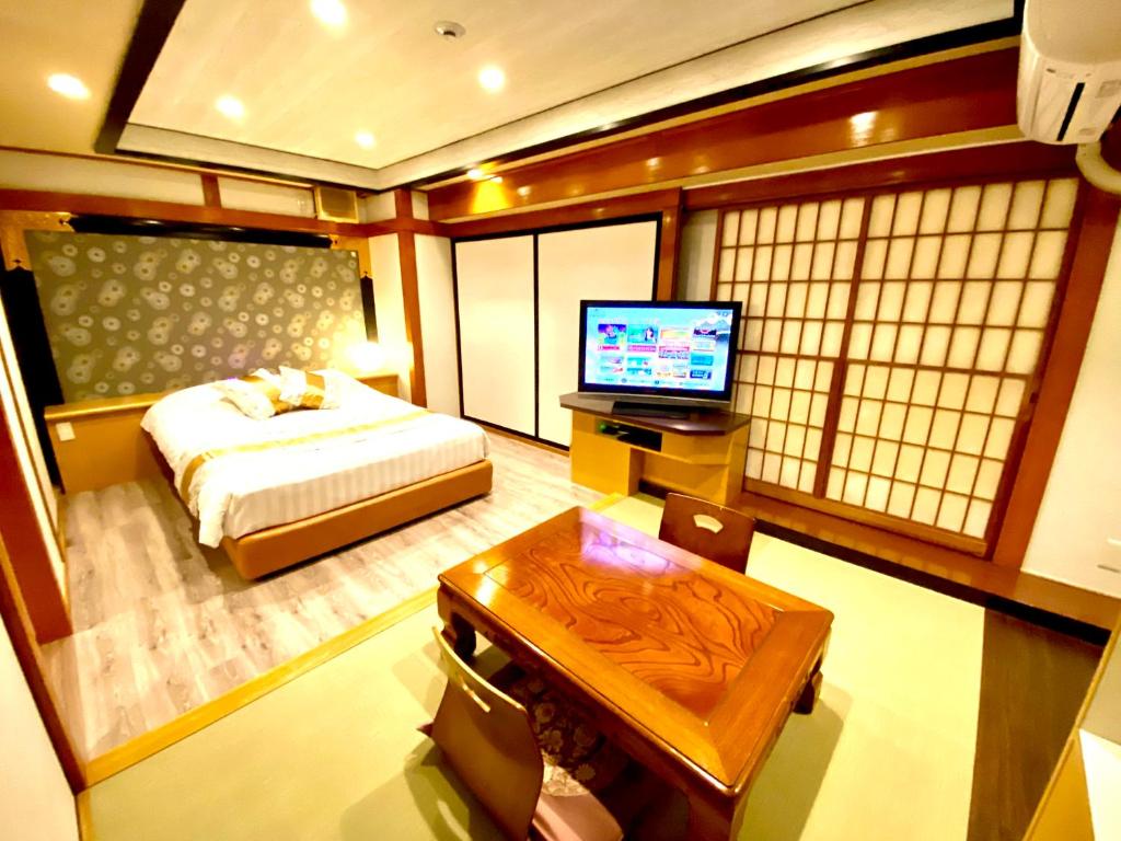 Postel nebo postele na pokoji v ubytování Hotel P'sResort Adults only 大人専用