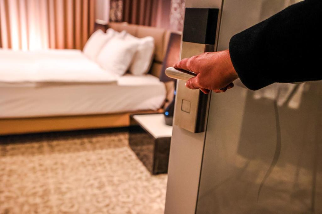 Letto o letti in una camera di Senator Hotel