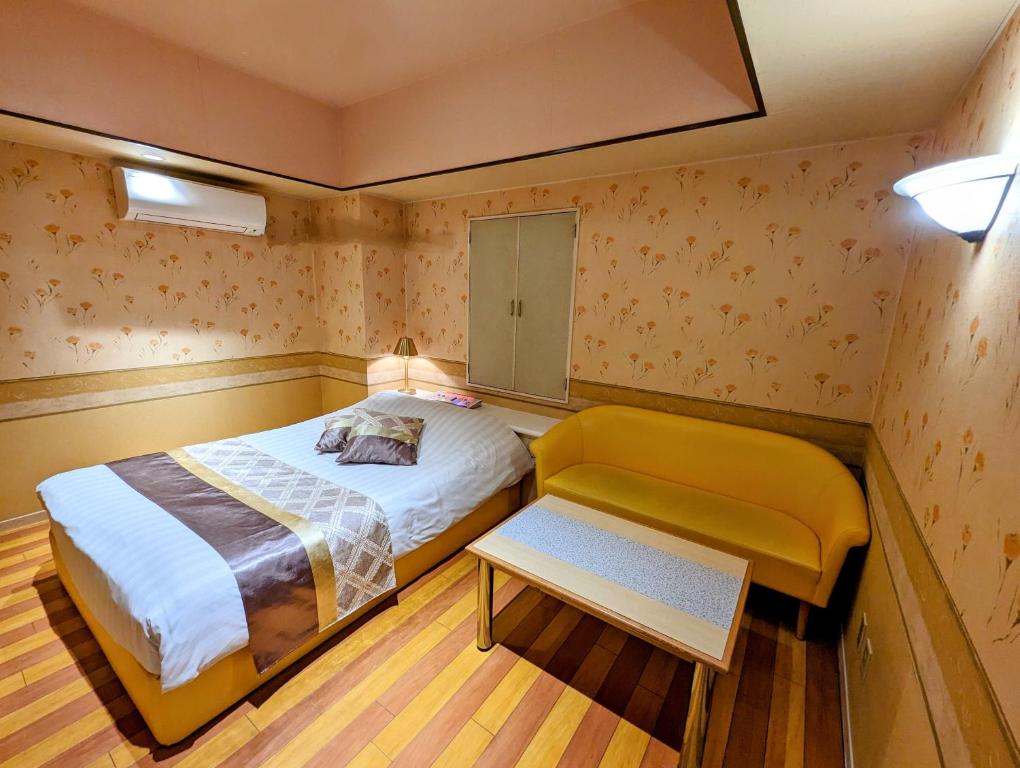 Postel nebo postele na pokoji v ubytování Hotel P'sResort Adults only 大人専用