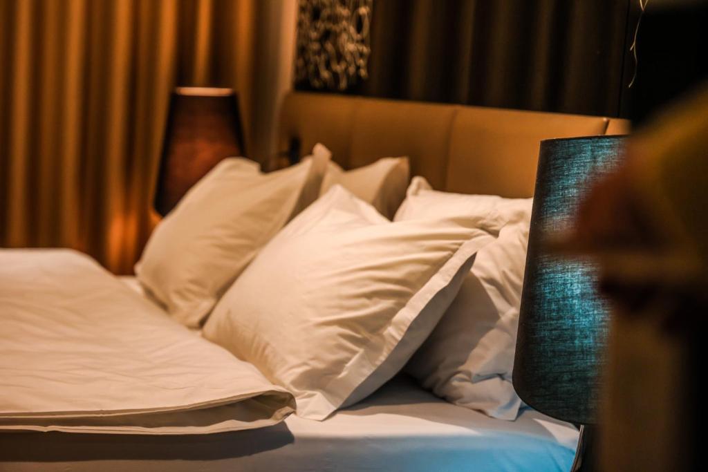 Letto o letti in una camera di Senator Hotel