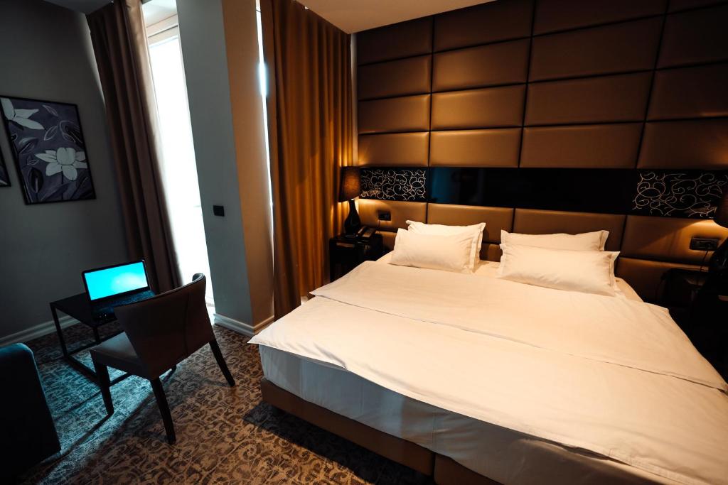 Letto o letti in una camera di Senator Hotel