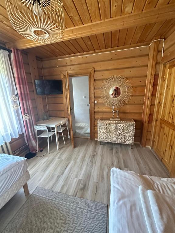Postel nebo postele na pokoji v ubytování Osada Barbanica
