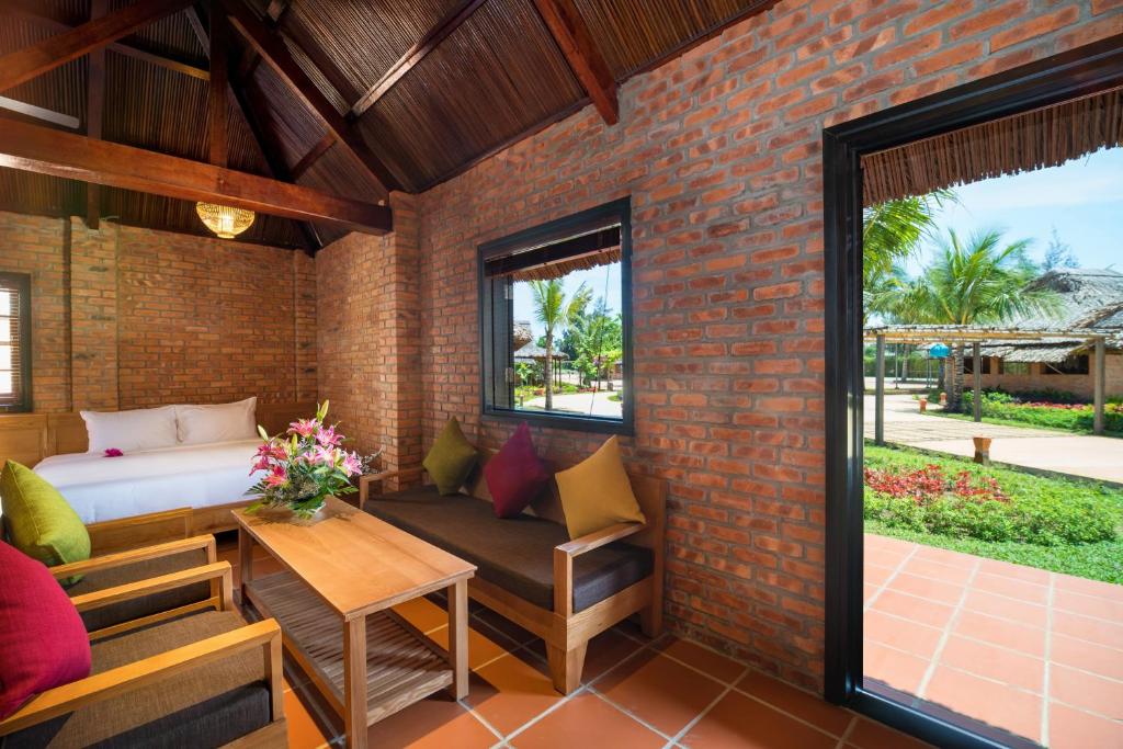 Posezení v ubytování ENSO Retreat Hoi An - Rediscovery & Serenity