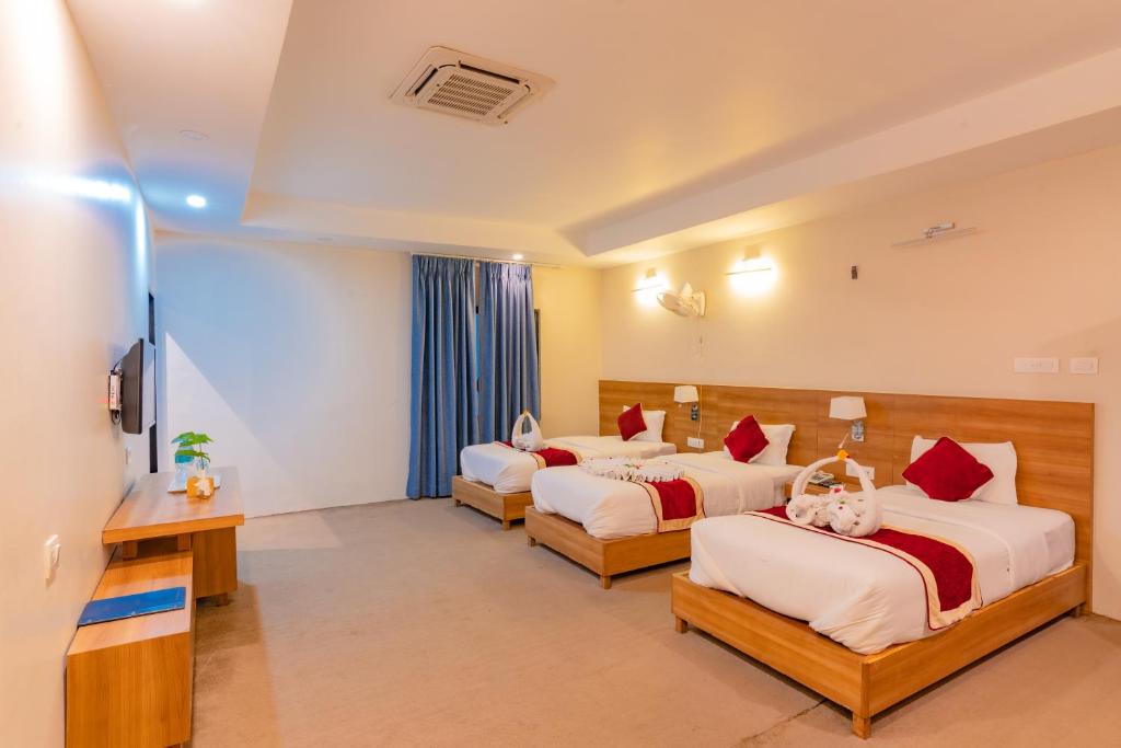Postel nebo postele na pokoji v ubytování Siddhartha Resort, Chisapani