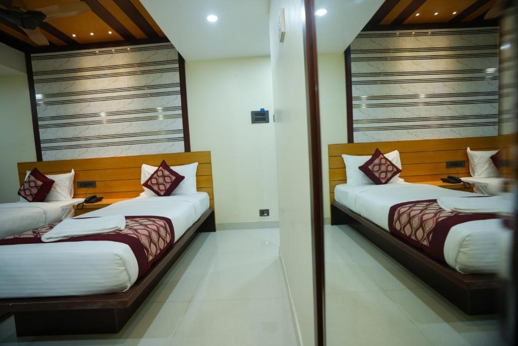 Postel nebo postele na pokoji v ubytování Urban Suites
