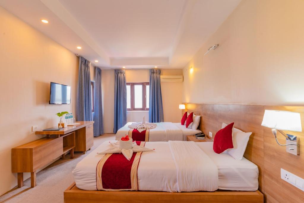 Postel nebo postele na pokoji v ubytování Siddhartha Resort, Chisapani