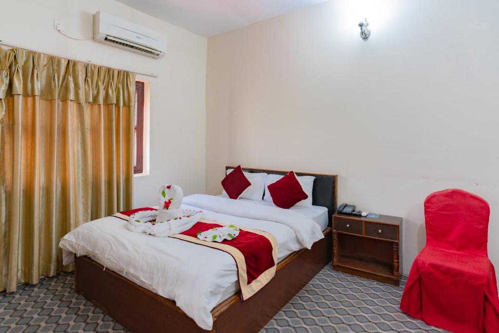 Postel nebo postele na pokoji v ubytování Siddhartha Resort, Chisapani