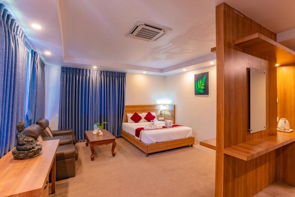 Postel nebo postele na pokoji v ubytování Siddhartha Resort, Chisapani
